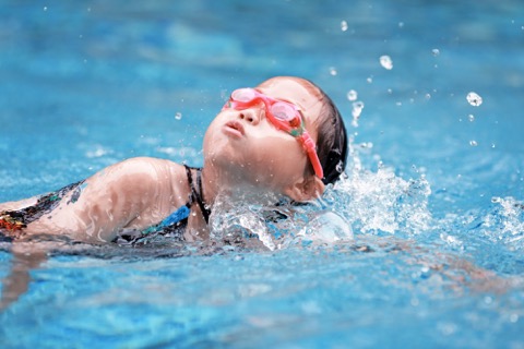 childhood-swimming-in-a-pool.