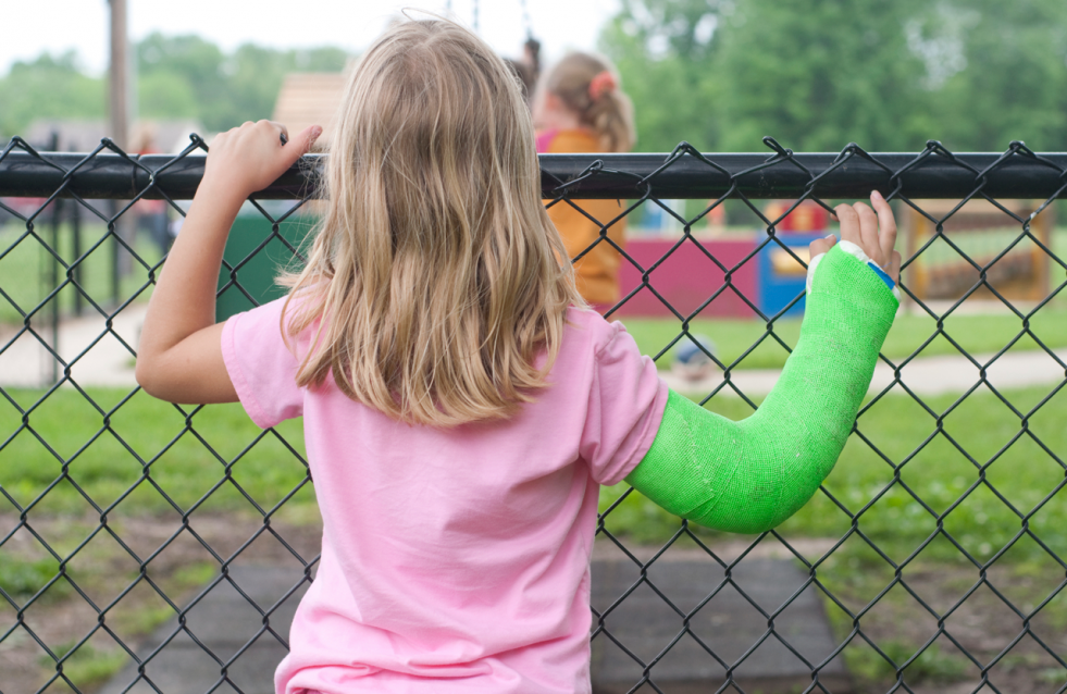 Young girl with a broken arm.