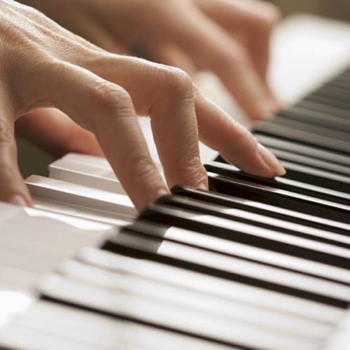 Playing the piano.