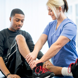 Doctor treating a patient.