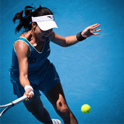 Woman playing tennis.