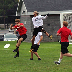 People playing ultimate frisbee.