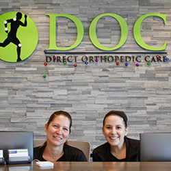 photo of two DOC receptionists.