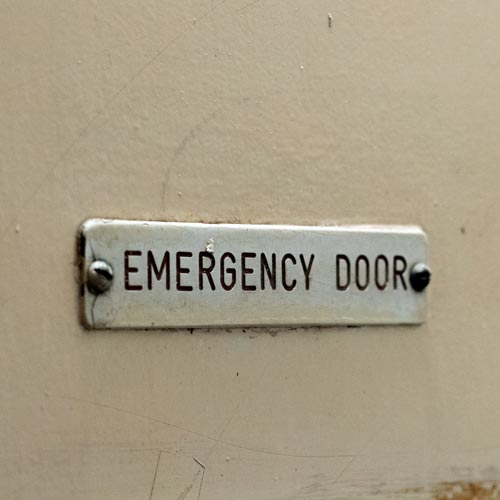 Door labeled, "Emergency Door".