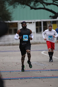 Adam participating in a race.