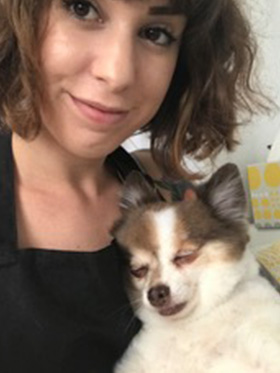 Selfie of Angie with her dog.