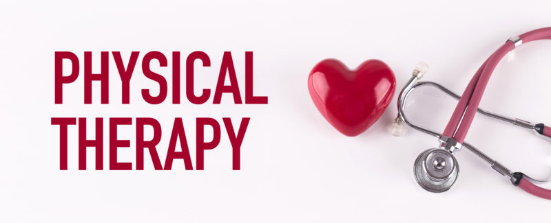 PHYSICAL THERAPY concept with stethoscope and heart shape.