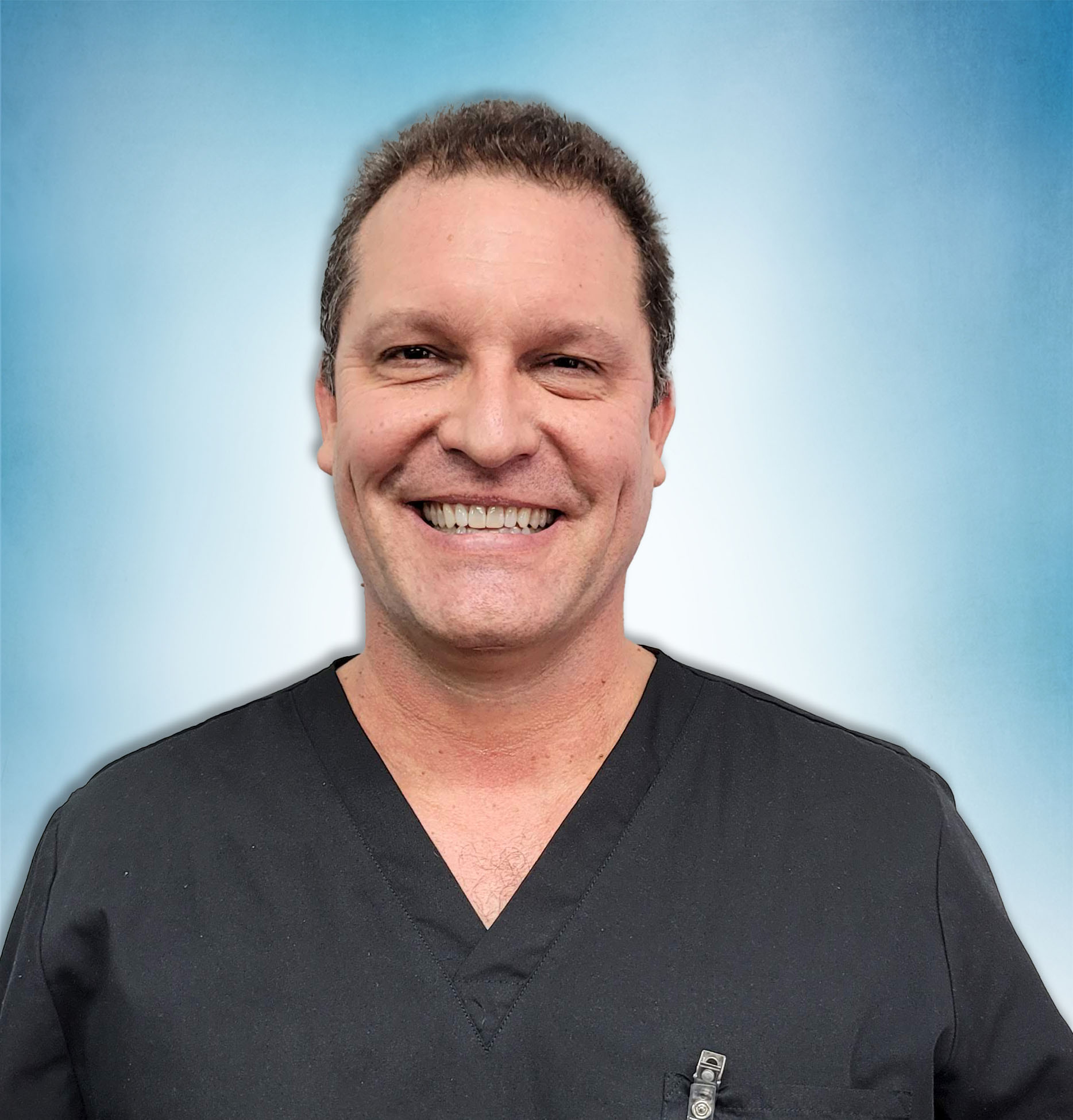 Headshot of Paul Erickson PT, OCS, COMT, CSCS, PES.