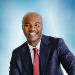 Headshot of Yaw Sarpong, MD, FAANS, MBA.